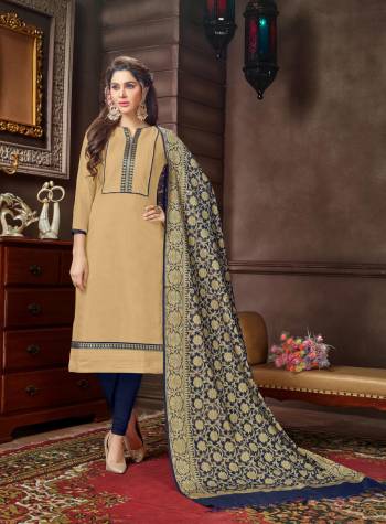 Flaunt Your Rich And Elegant Taste With This Dress Material In Beige Colored Top Paired With Navy Blue Colored Bottom And Dupatta. Its Top Is Fabricated On Cotton Silk Paired With Cotton Bottom And Banarasi Jacquard Dupatta. It Is Light Weight, Soft Towards Skin And Easy To Carry All Day Long.