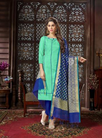 Look Pretty Wearing This Dress Material In Sea Green Colored Top Paired With Contrasting Royal Blue Colored Bottom And Dupatta. Its Top Is Fabricated On Cotton Silk Paired With Cotton Bottom And Banarasi Jacquard Dupatta.Get This Stitched As Per Your Desired Fit And Comfort.