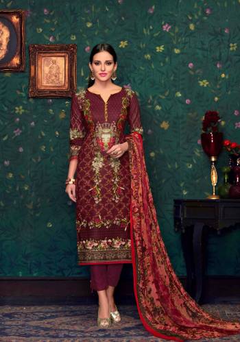 New And Unique Shade Is Here With This Beautiful Wine Colored Dress Material Paired With Wine Colored Bottom And Dupatta. Its Top And Bottom Are fabricated On Cotton Paired With Chiffon Dupatta. It Is Beautified With Prints Making The Suit Attractive. Buy Now.