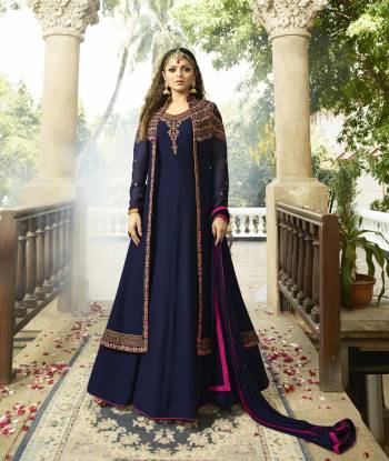 Enhance Your Personality Wearing This Designer Floor Length Suit In Navy Blue Color Paired With Navy Blue Colored Bottom And Dupatta. Its Top Is Fabricated On Georgette Paired With Santoon Bottom And Chiffon Dupatta. Its Pretty Jacket Pattern Will Earn You Lots Of Complimets From Onlookers. Buy Now.