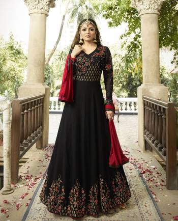 Enhance Your Beauty Wearing This Designer Floor Length Suit In Black Color Paired With Black Colored Bottom And Red Colored Dupatta. Its Top Is Fabricated On Georgette Paired With Santoon Bottom And Chiffon Dupatta. It IS Beautified with Attractive Jari and Resham Embroidery. Buy It Now.