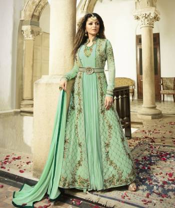 Add This Pretty Shade Of Green With This Designer Floor Length Suit In Sea Green Color Paired With Sea Green Colored Bottom And Dupatta. Its Top Is Fabricated On Georgette Paired With Santoon Bottom and Chiffon Dupatta. Its Beautiful Color And Pattern Will Earn You Lots Of Compliments From Onlookers.