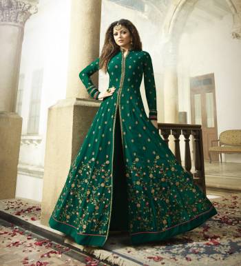 Celebrate This Festive And Wedding Season, Wearing This Attractive Shade Of Green With This Pine Green Colored Designer Floor Paired With Pine Green Colored Bottom and Dupatta. Its Top Is Fabricated On Georgette Paired With Santoon Embroidered Bottom And Chiffon Dupatta. It Has Pretty Embroidery All Over The Top. Buy It Now.