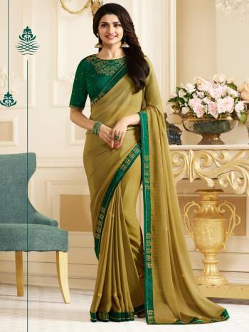 New Shade Is Here With This Pretty Saree In Pear Green Color Paired With Contrasting Pine Green Colored Blouse. This Saree Is Fabricated On Georgette Paired With Art Silk Fabricated Blouse. Its Beautiful Color Combination Will earn You Lots Of Compliments From Onlookers. Buy Now.