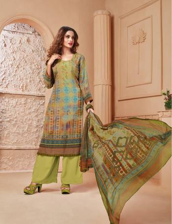 For Your Casual Or Semi-Casual Wear, Grab This Straight Cut Suit In Green Colored Top Paired With Light Green Colored Bottom And Multi Colored Dupatta. Its Top And Bottom Are Fabricated On Crepe Paired With Chiffon Dupatta Beautified with Prints All Over The Top And Dupatta. 