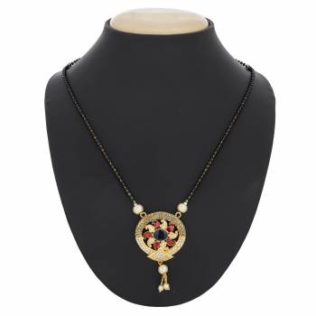 Grab This Pretty Simple Magalsutra For Your Daily Wear That Can Be Paired With Any Outfit. Its Pendant Is In Golden Color Beautified with Multi Colored Stones. Buy Now.