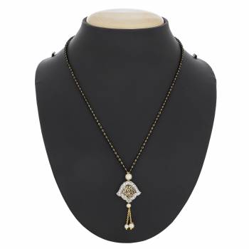 Lovely Mangalsutra Is Here With Very Pretty Small Elegant Pattern With Hangings. It Is Beautified With Whote Colored Stones And Pearls.