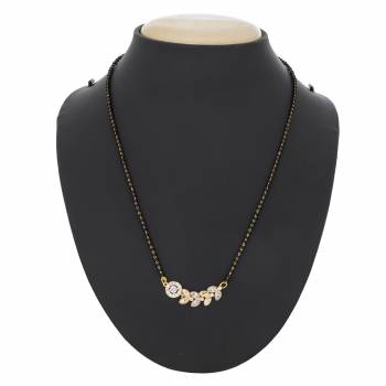 Elegant Looking Mangalsutra Is Here In Golden Colored Pendant Beautified with White Colored Stones . It Is Light Weight And Easy To Carry All Day Long.