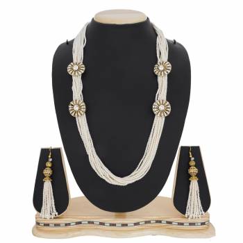 Here Is A Beautiful Queen Necklace Set In Golden And White Color Beautified with Stone and Moti Work. This Necklace Set Can Be Paired With Silk Saree Or Straigth Suit For A Beautiful Look. Buy Now.