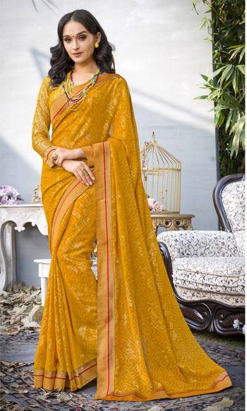 Celebrate This Festive Season Wearing This Saree In Musturd Yellow Color Paired With Musturd Yellow Colored Two Blouses. This Saree Is Fabricatted On Georgette Paired With Art Silk Fabricated Blouse And Another On Jacquard Net Fabric. This Bright And Pretty Color Will Earn You Lots Of Compliments From Onlookers And Make You Look Attractive.