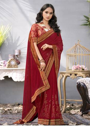 Adorn The Rich And Attractive Look Wearing This Saree In Maroon Color Paired With Two Blouses, Both In Maroon Color. This Saree Is Fabricated On Georgette Paired With One Art Silk Blouse And Another Jacquard Net Blouse. All Its Fabrics Are Light Weight, Soft Towards Skin And Easy To Carry All Day Long.