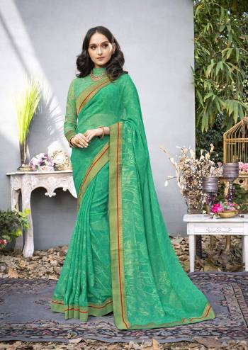 Add This Pretty Shade Of Green With This Saree In Sea Green Color Paired With Sea Green Colored Blouses. This Saree Is Fabricated On Georgette Paired With With Art Silk And Jacquard Net Two Blouses. Drape This Pretty Color And Look The Most Beautiful Of All. Buy Now.