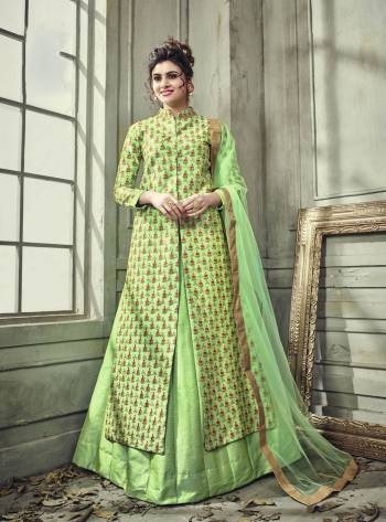 Have A Fresh Look Everytime You Wear This Readymade Indo-Western Suit In Green Colored Top Paired With Green Colored Bottom and Dupatta. Its Top Is Fabricated On Satin Silk Paired With Satin Silk Lehenga And Net Fabricated Dupatta. All three Fabrics Ensures Superb Comfort All Day Long.