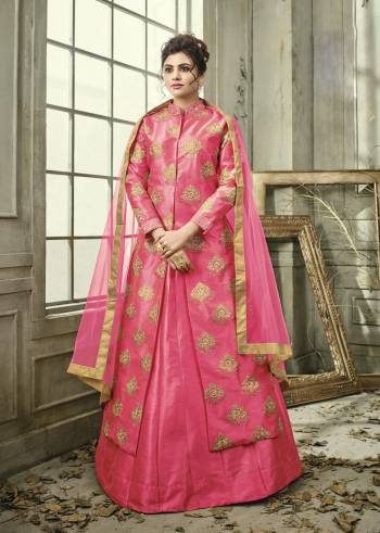 Shine Bright Wearing This Indo-Western Suit In Pink Color Paired With Pink Colored Bottom And Dupatta. Its Top Is Fabricated On Satin Silk Paired With Satin Silk Lehenga And Net Dupatta. This Suit Is Suitable For Any Wedding, Festive Or Social Function. Buy Now.