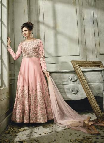 Look Pretty Wearing This Designer Floor Length Suit In Baby Pink Colored Top Paired With Baby Pink Colored Bottom And Dupatta. Its Top Is Fabricated On Satin Silk Paired With Santoon Bottom And Net Dupatta. This Readymade Suit Is Beautified With Heavy Jari Embroidery With Stone Work.