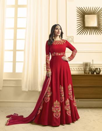 Adorn The Angelic Look Wearing This Designer Floor Length Suit In Red Colored Top Paired With Red Colored Bottom And Dupatta. Its Top Is Fabricated On Art Silk Paired With Santoon Bottom And Chiffon Dupatta. It Is Beautified With Contrasting Embroidery. Buy Now.