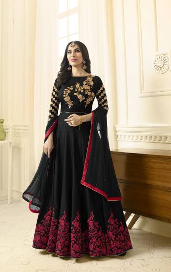 Enhance Your Beauty Wearing This Designer Floor Length Suit In Black Colored Top Paired With Black Colored Bottom And Dupatta. Its Top Is Fabricated On Art Silk Paired With Santoon Bottom And Chiffon Dupatta. It Has Attractive Embroidery Which Will Earn You Lots Of Compliments From Onlookers.