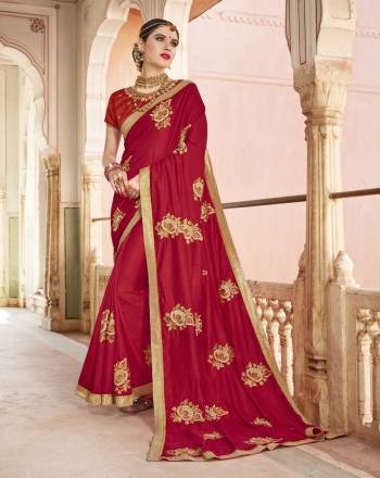 Adorn The Beautiful Angelic Look Wearing This Saree In Red Color Paired With Red Colored Blouse. This Saree Is Fabricated On Satin Silk Paired With Art Silk Fabricated Blouse. This Saree Has Embroidered Motifs Which Looks Attractive. Buy Now.