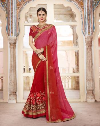 Grab This Pretty Shaded Saree In Pink And Red Color paired With Red Colored Blouse. This Saree Is Fabricated On Silk and Georgette Paired With Art Silk Fabricated Blouse. It Is Light Weight, Easy To Drape And Durable. This Saree IS Suitable For Festive Wear Or Any Social Function.