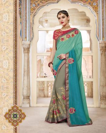 Go Colorful Wearing This Saree In Shades Of Blue And grey color Paired With Contrasting Pink Colored Blouse. This Saree Is Fabricated On Silk And Chiffon Paired With Art Silk Fabricated Blouse. This Unique Designer Saree Will Earn You Lots Of Compliments From Onlookers.