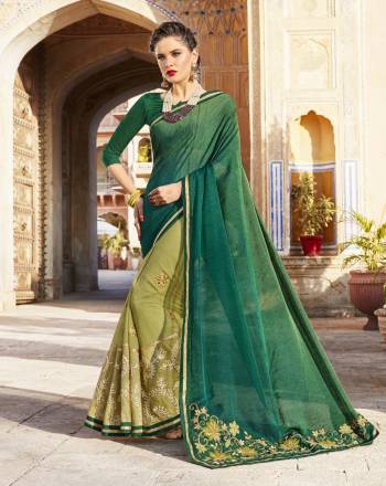 Go With The Shades Of Green With This Designer Saree In Shaded Green Color Paired With Green Colored Blouse. This Saree Is Fabricated On Silk Georgette Paired With Art Silk Fabricated Blouse. It Is Light Weight And Easy To Carry All Day Long.