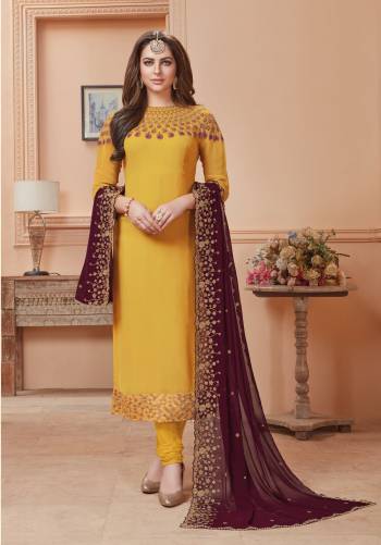 Celebrate This Festive Season With This Lovely Straight Cut Designer Suit In Yellow Colored Top Paired With Yellow Colored Bottom And Contrasting Wine Colored Dupatta. Its Embroidered Top Is Fabricated On Georgette Paired With Santoon Bottom And Embroidered Chiffon Dupatta. Buy Now.