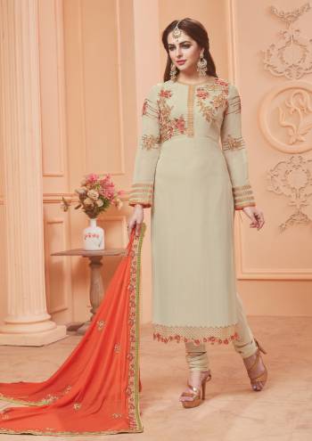 Flaunt Your Rich And Elegant Taste Wearing This Cream Colored Designer Straight Cut Suit Paired With Contrasting Orange Colored Dupatta. Its Top Is Fabricated On Georgette Paired With Santoon Bottom And Chiffon Dupatta. It Is Contrasting Embroidery Over Its Top and Dupatta. Buy Now.