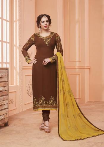 Grab This Designer Straight Cut Suit In Brown colored Top Paired With Brown Colored Bottom And Contrasting Yellow Colored Dupatta. Its Top Is Fabricated On Georgette Paired With Santoon Bottom And Chiffon Dupatta. Its All Three Fabrics Ensures Superb Comfort All Day Long. Buy Now. 