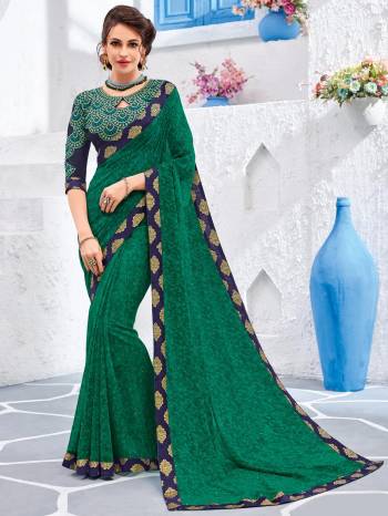 Presenting this green color Georgette saree. Ideal for party, festive & social gatherings. this gorgeous saree featuring a beautiful mix of designs. Its attractive color and designer embroidered design, stone, designer heavy blouse and beautiful floral design work over the attire & contrast hemline adds to the look. Comes along with a contrast unstitched blouse.