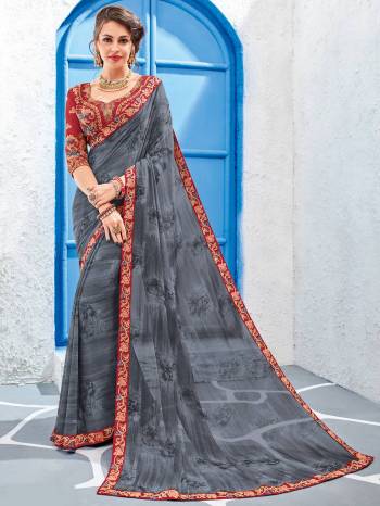 you Look striking and stunning afler wearing this grey color Georgette saree. look gorgeous at an upcoming any occasion wearing the saree. this party wear saree won't fail to impress everyone around you. Its attractive color and designer embroidered design, stone, designer heavy blouse and beautiful floral design work over the attire & contrast hemline adds to the look. Comes along with a contrast unstitched blouse.