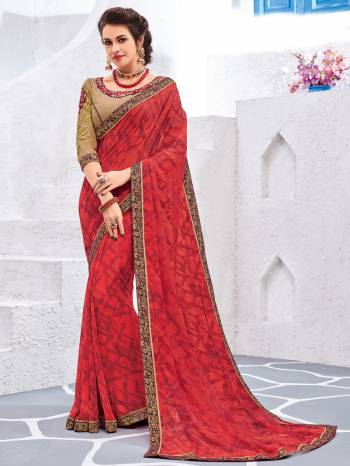 Presentingthis red color Georgette saree. look gorgeous at an upcoming any occasion wearing the saree. this party wear saree won't fail to impress everyone around you. Its attractive color and designer embroidered design, stone, designer heavy blouse and beautiful floral design work over the attire & contrast hemline adds to the look. Comes along with a contrast unstitched blouse.