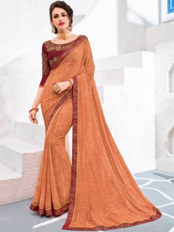 Drape this Light orange color Georgette saree. this gorgeous saree featuring a beautiful mix of designs. look gorgeous at an upcoming any occasion wearing the saree. Its attractive color and designer embroidered design, stone, designer heavy blouse and beautiful floral design work over the attire & contrast hemline adds to the look. Comes along with a contrast unstitched blouse.