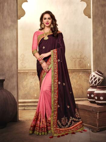 Color That Is Liked By All The Women Is Here In Wine And Pink Color Paired With Pink Colored Blouse. This Saree Is Fabricated On Silk Georgette And Art Silk Paired With Art Silk Fabricated Blouse. This Pretty Combination Will earn Your Lots Of Compliments And Make You Look Attractive.