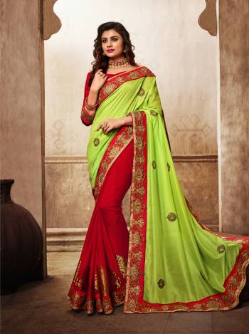 Proper Traditional Combination Is Here With This Pretty Saree In Light Green And Red Color Paired With Red Colored Blouse. This Saree Is Fabricated On Silk Georgette Paired With Art Silk Fabricated Blouse. It Is Light Weight, Durable And Easy To Carry For.