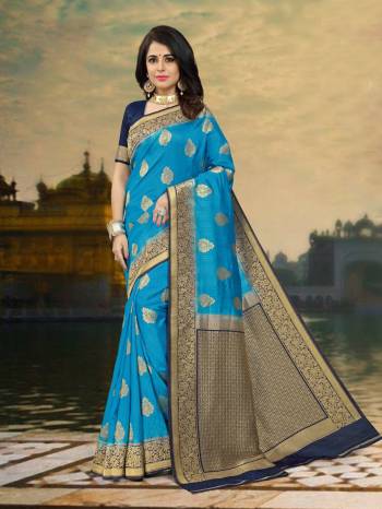 Go With The Shades Of Blue With This Saree In Blue Color Paired With Navy Blue Colored Blouse. This Saree And Blouse Are Fabricated On Art Silk Which Is Durable And Easy To Care For. Buy This Pretty Saree Now.4