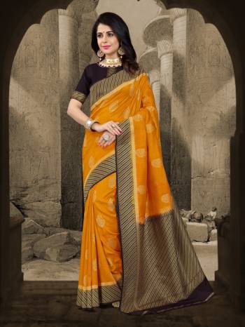 Grab This Beautiful Saree In Musturd Yellow Color Paired With Black Colored Blouse. This Saree And Blouse Are Fabricated On Art Silk Beautified With Weave. This Silk Fabric Will Give A Rich Look To Your Personality.