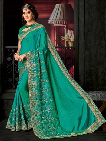 Presenting this Sea green color two-tone silk saree. Ideal for party, festive & social gatherings. this gorgeous saree featuring a beautiful mix of designs. Its attractive color and designer embroidered design, patch design, stone, heavy designer blouse, beautiful floral design work over the attire & contrast hemline adds to the look. Comes along with a contrast unstitched blouse.