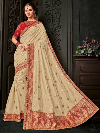 you Look striking and stunning after wearing this beige color silk fabrics saree. look gorgeous at an upcoming any occasion wearing the saree. this party wear saree won't fail to impress everyone around you. Its attractive color and designer embroidered design, heavy designer blouse, beautiful floral design work over the attire & contrast hemline adds to the look. Comes along with a contrast unstitched blouse.