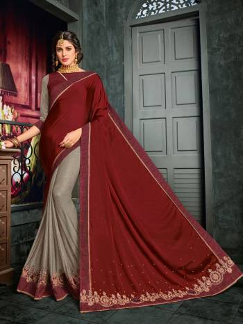 Drape this maroon and grey color Bright georgette and lycra pattern saree. this gorgeous saree featuring a beautiful mix of designs. look gorgeous at an upcoming any occasion wearing the saree. Its attractive color and designer embroidered design, patch design, stone, heavy designer blouse, beautiful floral design work over the attire & contrast hemline adds to the look. Comes along with a contrast unstitched blouse.