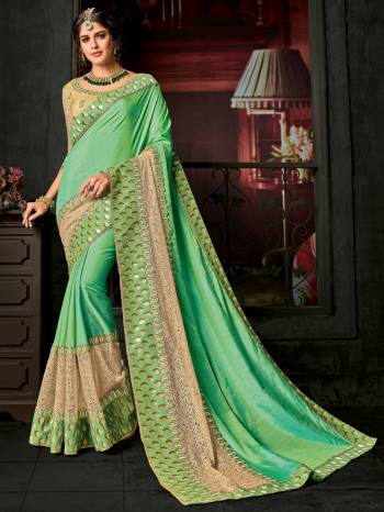 Presenting this Light Green color two-tone silk saree. Ideal for party, festive & social gatherings. this gorgeous saree featuring a beautiful mix of designs. Its attractive color and designer embroidered design, heavy designer blouse, cut paste saree, beautiful floral design work over the attire & contrast hemline adds to the look. Comes along with a contrast unstitched blouse.