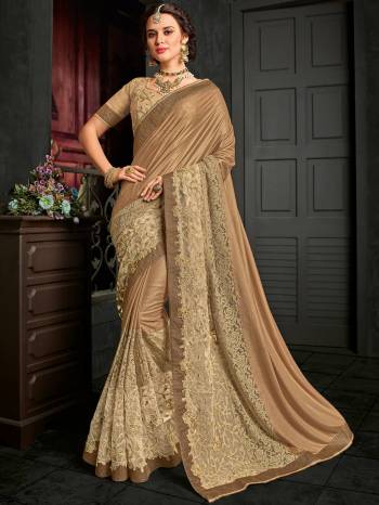 Show your elegance by wearing this gorgeous golden and beige color lycra pattern saree. Ideal for party, festive & social gatherings. this gorgeous saree featuring a beautiful mix of designs. Its attractive color and designer embroidered design, patch design, stone, heavy designer blouse, cut paste design saree, beautiful floral design work over the attire & contrast hemline adds to the look. Comes along with a contrast unstitched blouse.