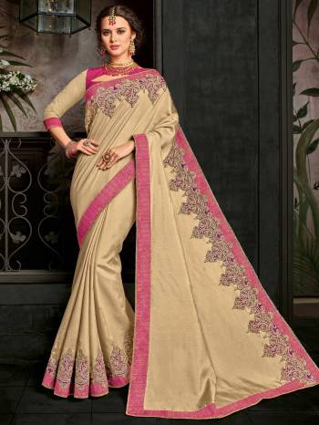 Flaunt your gorgeous look wearing this beige color silk fabrics saree. Ideal for party, festive & social gatherings. this gorgeous saree featuring a beautiful mix of designs. Its attractive color and designer embroidered design, patch design, stone, heavy designer blouse, beautiful floral design work over the attire & contrast hemline adds to the look. Comes along with a contrast unstitched blouse.