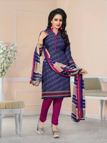 Grab This Dress Material In Dark Blue Colored Top Paired With Contrasting Magenta Pink Colored Bottom And Multi Colored Dupatta. Its Top And Bottom Are Fabricated On Cotton Paired With Chiffon Dupatta. Buy Now.