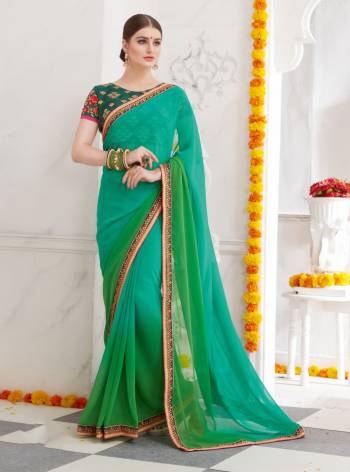 Go With This Shades Of Green Wearing This Designer Saree In Sea Green And Green Color Paired With Teal Green Colored Blouse. This Saree Is Fabricated On Georgette Paired With Art Silk Fabricated Blouse. Its Designer Blouse Is Beautified With Embroidery With Embroidered Saree Lace Border. Buy Now.