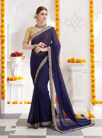 Add This Lovely Shade To Your Wardrobe With This Designer Saree In Violet Color Paired With Beige Colored Blouse, This Saree Is Fabricated On Georgette Paired With Art Silk Fabricated Blouse. It Is Light Weight And Ensures Superb Comfort Throughout The Gala.