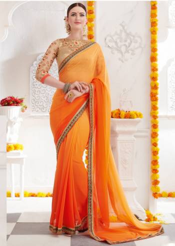 Flaunt Your Rich And Elegant Taste Wearing This Designer Saree In Yellow and Orange Color Paired With Beige Colored Blouse, This Saree Is Fabricated On Georgette Paired With Art Silk And Net Fabricated Blouse. This Lovely Saree Will Give You A Very Pretty Look Like Never Before. Buy Now.