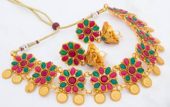 Here Is A Beautiful And Heavy Necklace Set In Golden Color Beautified With Pink And Green Colored Heavy Stone Work. This Necklace Can Be Paired With Saree Or Lehenga Choli. Buy Now.