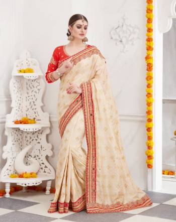 Celebrate This Festive Season Wearing This Designer Saree In Beige Color Paired With Orange Colored Blouse. This Saree Is Fabricated On Satin Silk Paired With Art Silk Fabricated Blouse. Both Its Fabrics Ensures Superb Comfort All Day Long. Buy Now.