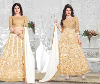 Flaunt Your Rich Taste Wearing This Beautiful Set Of Lehenga Choli Which Can Also Be Made As An Anarkali Suit As Per Your Choice. Its Blouse Is In Beige Coor Paired With White Colored Lehenga And Dupatta And Also Beige Colored Bottom. Get This Stitched As Per Your Occasion And Comfort.