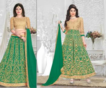 New And Unqiue Shade OF Green Is Here To Add Up Into Your Wardrobe With This Two In One Suit Which Can Be Made As Lehenga Choli Or Anarkali Suit. Its Blouse Is Fabricated On Art Silk Paired With Net Lehenga, Santoon Bottom And Chiffon Dupatta. All The Fabrics Ensures Superb Comfort All Day Long. 